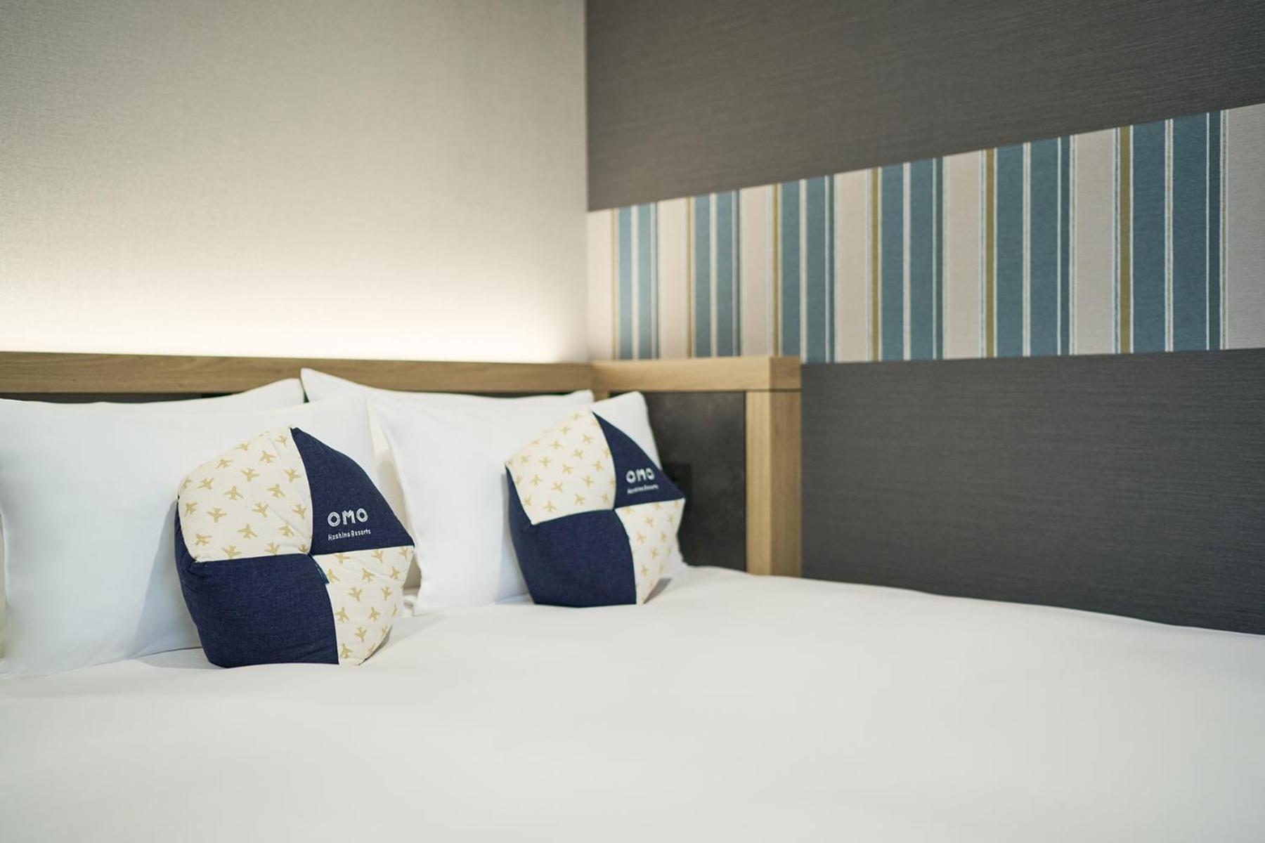 Omo Kansai Airport By Hoshino Resorts Izumisano Exterior foto A bed at a hotel